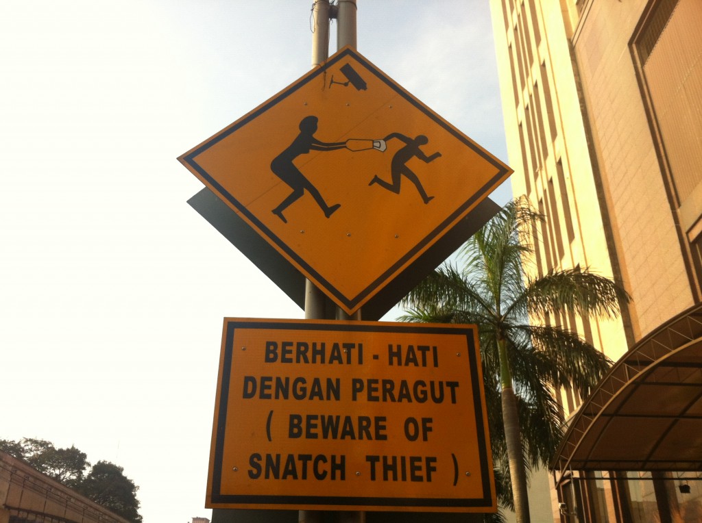 Beware of the infamous SNATCH THIEF! Not the most welcoming sign. 