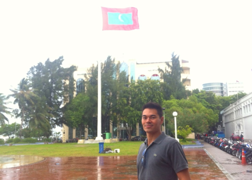 Rainy <strong>Republic Square</strong> and the flag of the Maldives. 