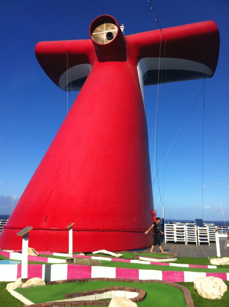 Mini-golf is situated next to the ship's chimney and horn. Difficult to play in the amount of wind that is up here normally.