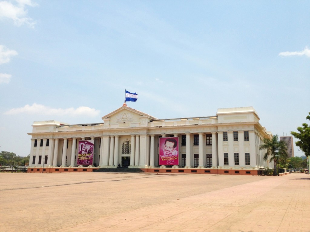 The National Palace with the Nicaraguan flag waving in the wind.