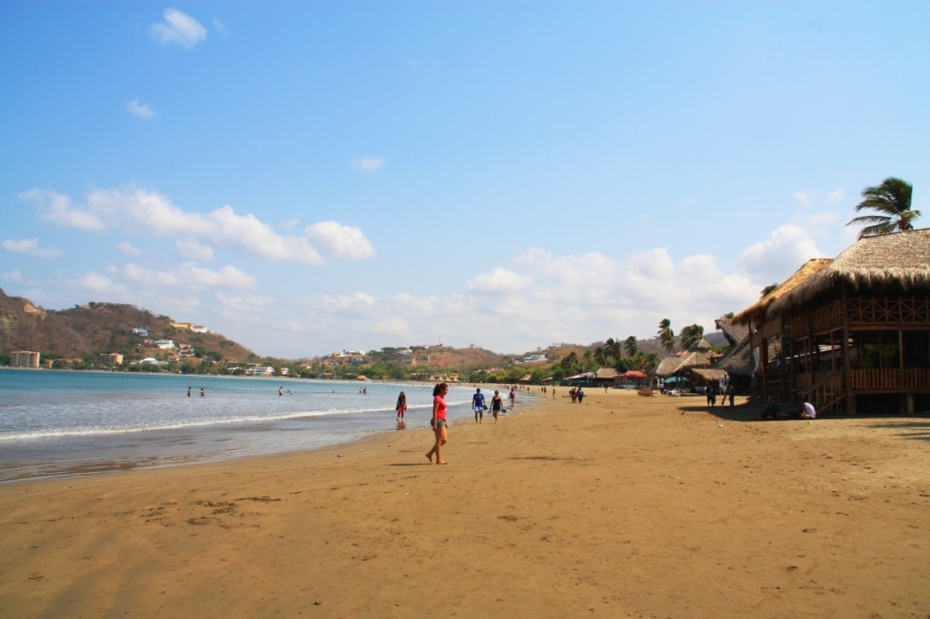 Locals and tourists alike enjoy the beach at San Juan del Sur.