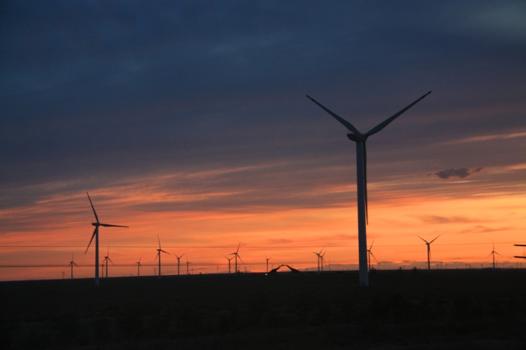 Passing a wind farm at dusk.